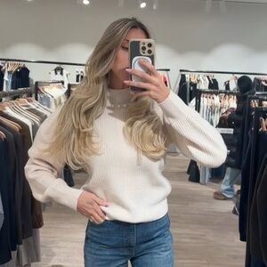 Elegant Cream Sweater with Pearl Detailing